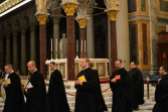 The Benedictine monks returning to the monastery after Evening Prayer.
